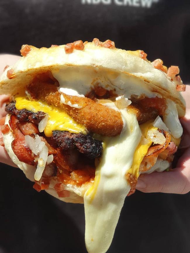 The Lying Lockdown Pizza Burger had mozzarella, bacon, napoli sauce in a bacon and cheese roll. Picture: Natural Born Grillers.