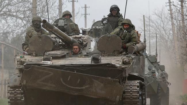 Service members of pro-Russian troops near the southern port city of Mariupol. Picture: Reuters.