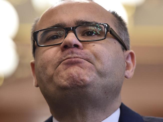 Former Victorian Small Business Minister Adem Somyurek speaks at a media conference at Victorian parliament in Melbourne, Tuesday, July 28, 2015. Somyurek has resigned from the ministry following bullying allegations made by his former chief of staff. (AAP Image/Julian Smith) NO ARCHIVING