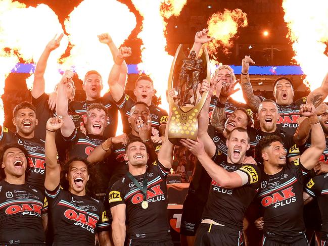 SYDNEY, AUSTRALIA - OCTOBER 01: The Panthers players celebrate victory as the hold up the premiership trophy after the 2023 NRL Grand Final match between Penrith Panthers and Brisbane Broncos at Accor Stadium on October 01, 2023 in Sydney, Australia. (Photo by Bradley Kanaris/Getty Images)