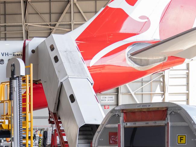 The Australian airline has stripped one of its planes bare before it travels overseas to be converted into an air frieghter.