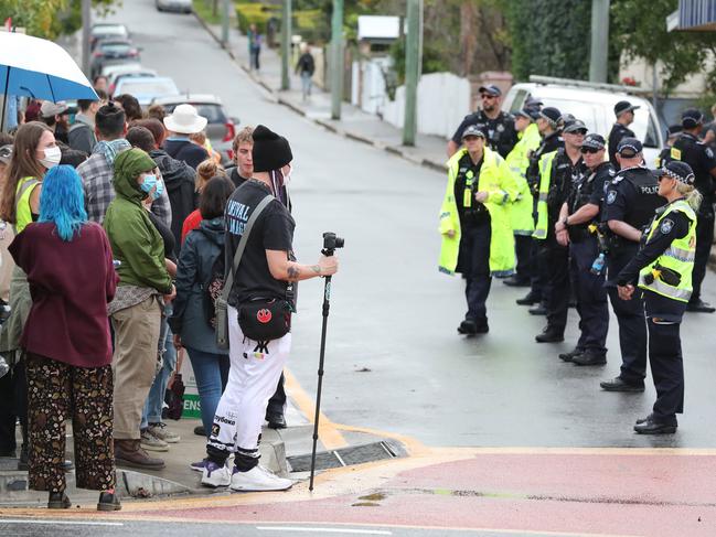 Police hold the line outside a Kangaroo Point hotel. Picture: Peter Wallis