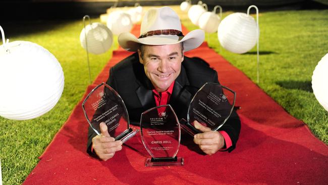 Uluru Camel Tours Chris Hill picked up three awards at the 2013 Tourism Central Australia Awards Dinner.