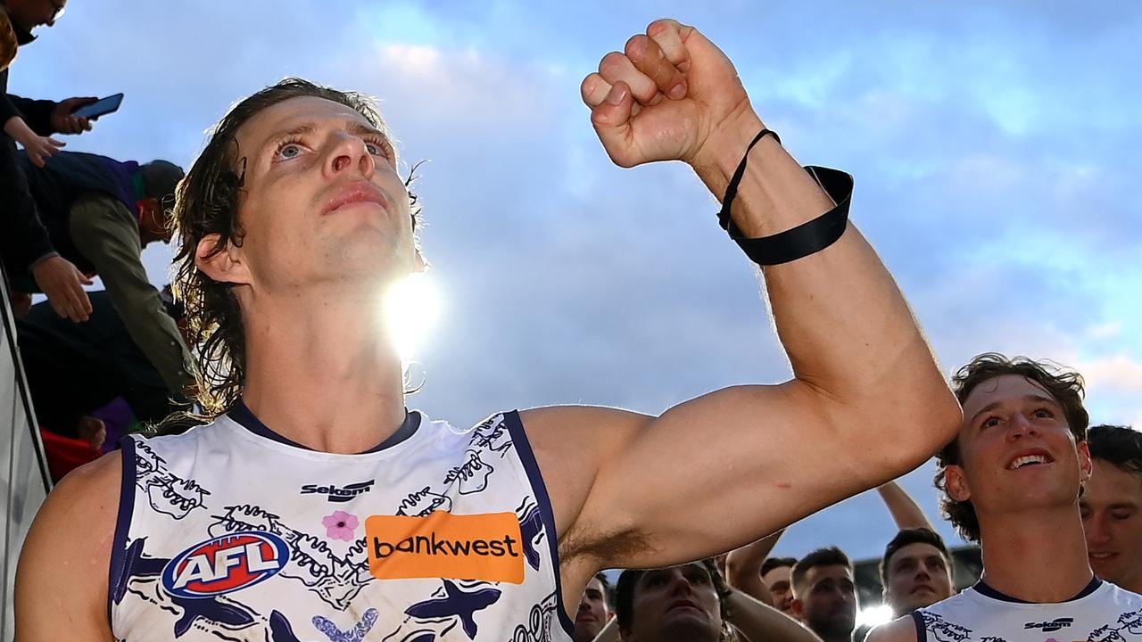 MELBOURNE, AUSTRALIA - MAY 27: Nat Fyfe of the Dockers celebrates winning the round 11 AFL match between Narrm Football Club / Melbourne Demons and Walyalup / Fremantle Dockers at Melbourne Cricket Ground, on May 27, 2023, in Melbourne, Australia. (Photo by Quinn Rooney/Getty Images)