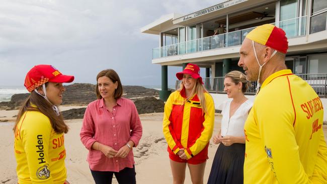 Queensland LNP Leader Deb Frecklington and Currumbin MP Laura Gerber speaking with lifesavers at Currumbin.