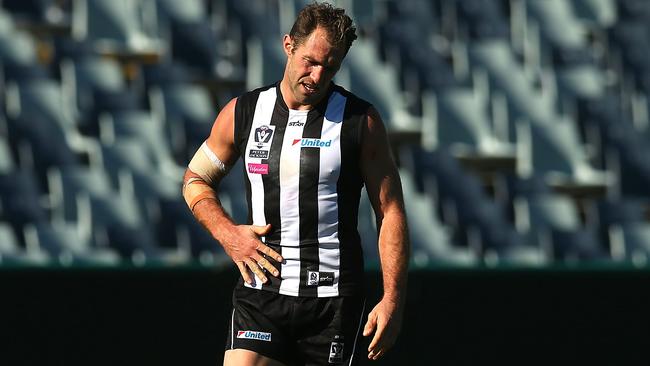 Travis Cloke reacts after missing a shot in the VFL.