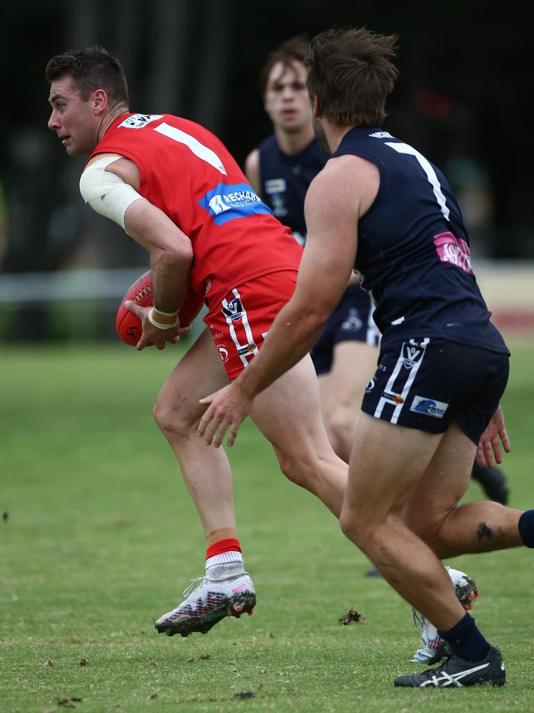 Joel Bennett with the ball for Corio.