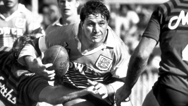 Billy Noke charges into the North Sydney defence during the Broncos’ six-game winning streak that marked their entry into the NSWRL in 1988.