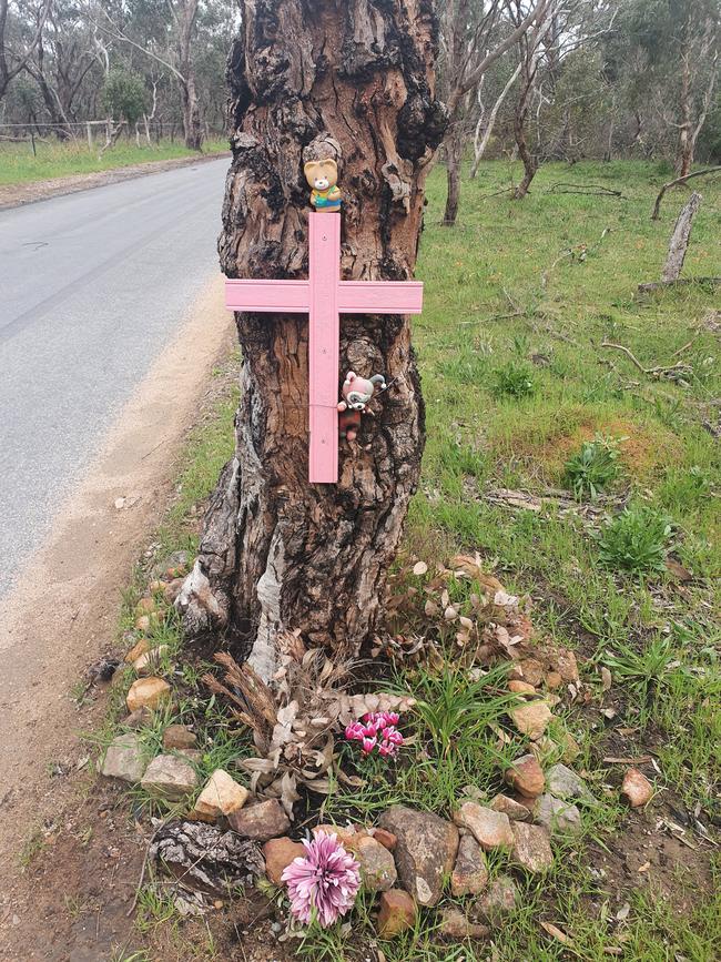 A memorial honouring the life of a 56-year-old woman has been removed from Piggott Range Rd. Picture: Supplied