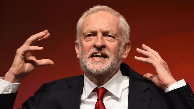 Britain's opposition Labour Party leader Jeremy Corbyn addresses delegates on the final day of the Labour party conference in Liverpool, north west England on September 26, 2018. (Photo by Oli SCARFF / AFP)