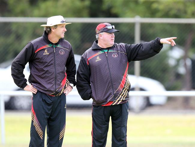 Afghanistan World Cup Cricket team have a trial match against Grade Club West Torrens at Henley Oval. Assistant coach Peter Anderson (white hat) and Coach Andy Moles watch the match. Photo Sarah Reed