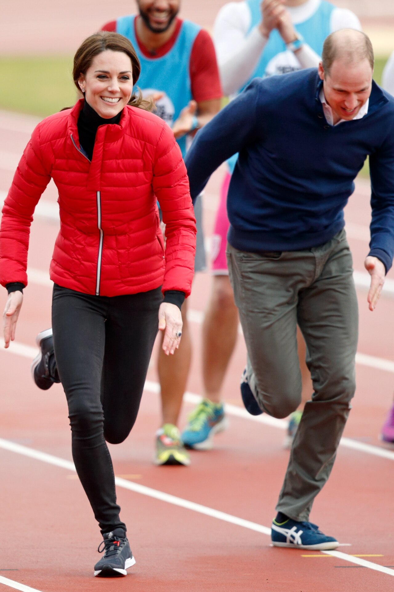 <p>Racing her husband, Prince William. </p>