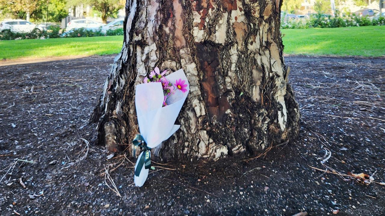 Flowers left in Brougham Gardens, North Adelaide, where Aaron Stahlhut was allegedly murdered. Picture: Darcy Fitzgerald