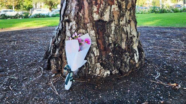 Flowers left in Brougham Gardens, North Adelaide, where Aaron Stahlhut was allegedly murdered. Picture: Darcy Fitzgerald