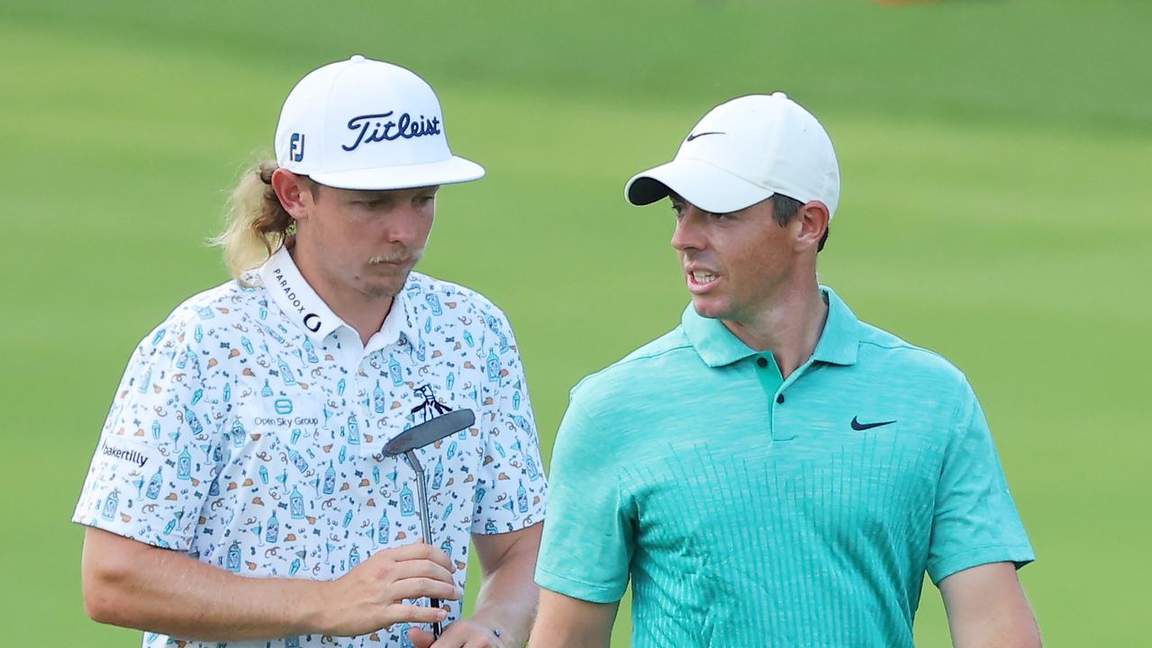 ATLANTA, GEORGIA - AUGUST 26: Cameron Smith of Australia and Rory McIlroy of Northern Ireland walk on the 18th hole during the second round of the TOUR Championship at East Lake Golf Club on August 26, 2022 in Atlanta, Georgia. (Photo by Kevin C. Cox/Getty Images)