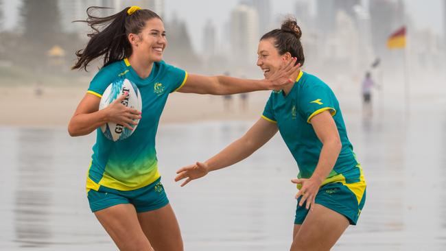 Charlotte Caslick and Emilee Cherry of the Australian Women's Sevens team were teammates in touch football as well. Pic: RUGBY.com.au/Stuart Walmsley