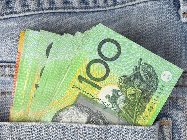 Australian 100 dollar notes in jeans pocket. money, wealthy, rich generic