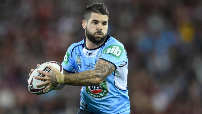 Reynolds copped a drive-by from Gould. Photo: NRL Photos