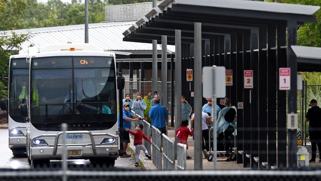 Evacuees from Wuhan, China arrive by bus at Maingurr-Ma Camp in Howard Springs on February 9. Picture: Che Chorley