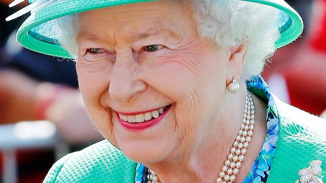 GLASGOW, SCOTLAND - JULY 24: Queen Elizabeth II meets delegates and athletes on a visit to the Athlete's village during day one of the 20th Commonwealth Games on July 24, 2014 in Glasgow, Scotland. (Photo by Danny Lawson - WPA Pool/Getty Images)