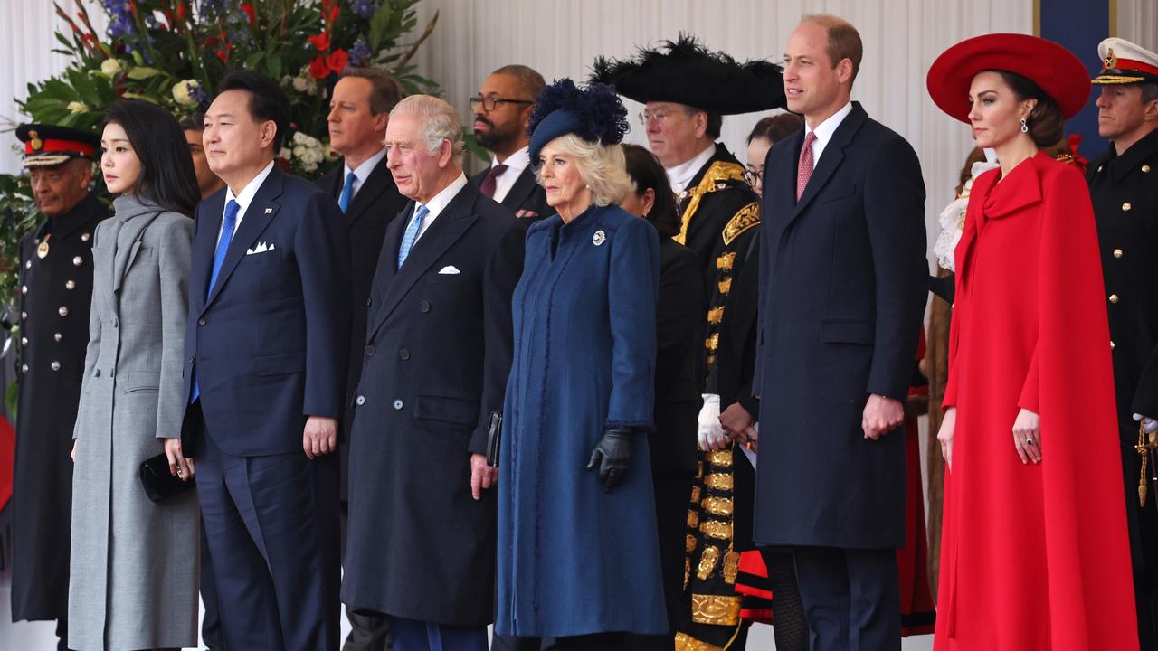 Catherine wowed in a red cape and hat. Picture: Getty Images