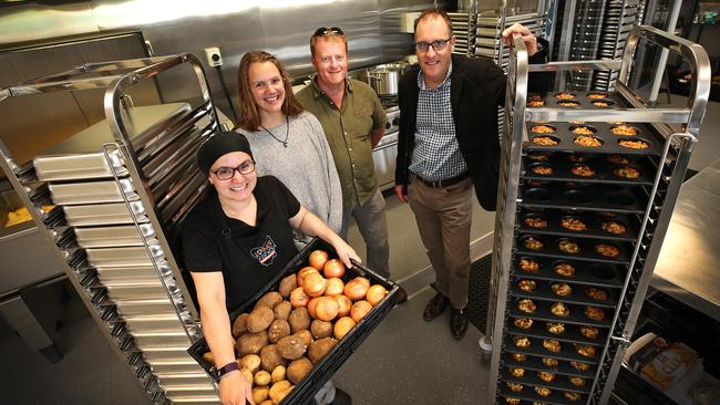 Win for all: Kitchen manager Renee Debryn, agricultural science student Katie Zarb, Stephen Quarrell from TIA and Loaves and Fishers chief Andrew Hillier at the Devonport facility. Picture: Chris Kidd