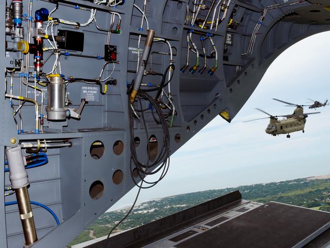 ARH Tiger and CH-47F Chinook helicopters fly in Darwin skies as part of Exercise Vigilant Scimitar designed to integrate helicopters from the 1st Aviation (Darwin) and the 5th Aviation (Townsville) Regiments.