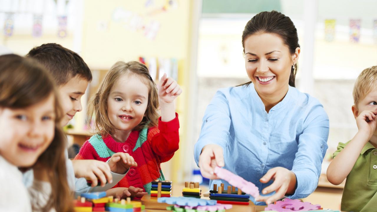 Generic photo of a childcare worker and children in a daycare centre