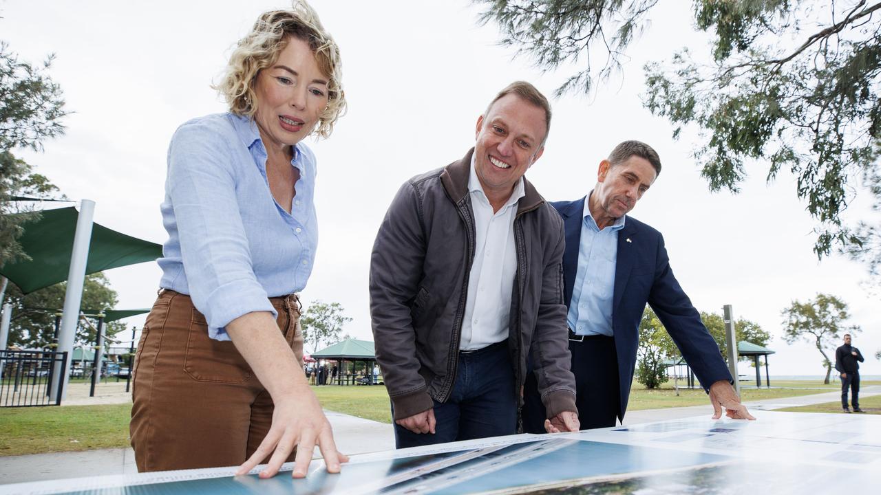 Pumicestone MP Ali King, Premier Steven Miles and Treasurer Cameron Dick at Bongaree on Tuesday look over plans for a proposed new bridge to Bribie Island. Picture Lachie Millard