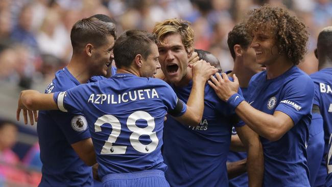 Chelsea's Marcos Alonso, centre, celebrates.