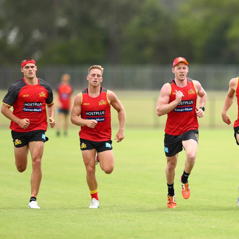 Players run at training. (Photo by Chris Hyde/Getty Images)