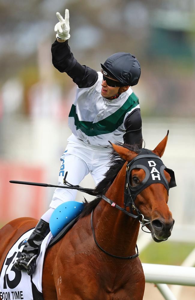 Ka-boom: Jockey Cory Parish acknowledges his win aboard Boom Time. Picture: Getty Images