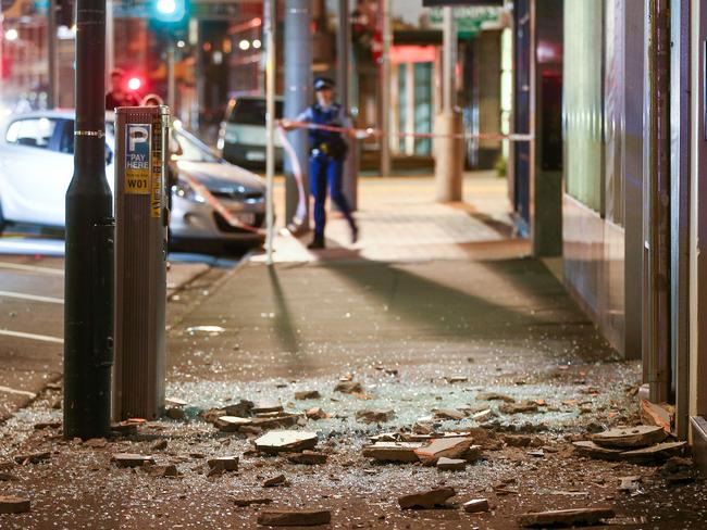 Glass and rubble covers the footpath on Wakefield Street after an earthquake on November 14, 2016 in Wellington, New Zealand. Picture: Hagen Hopkins/Getty Images