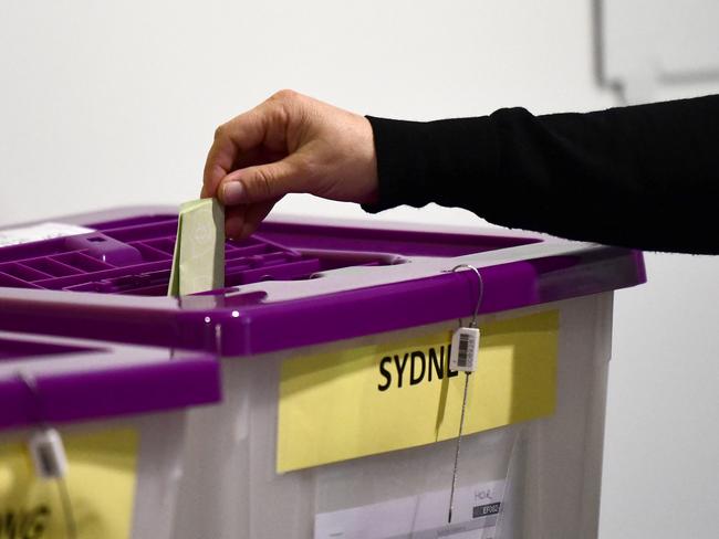 A voters placing an early vote at a pre-polling booth. Picture: AAP