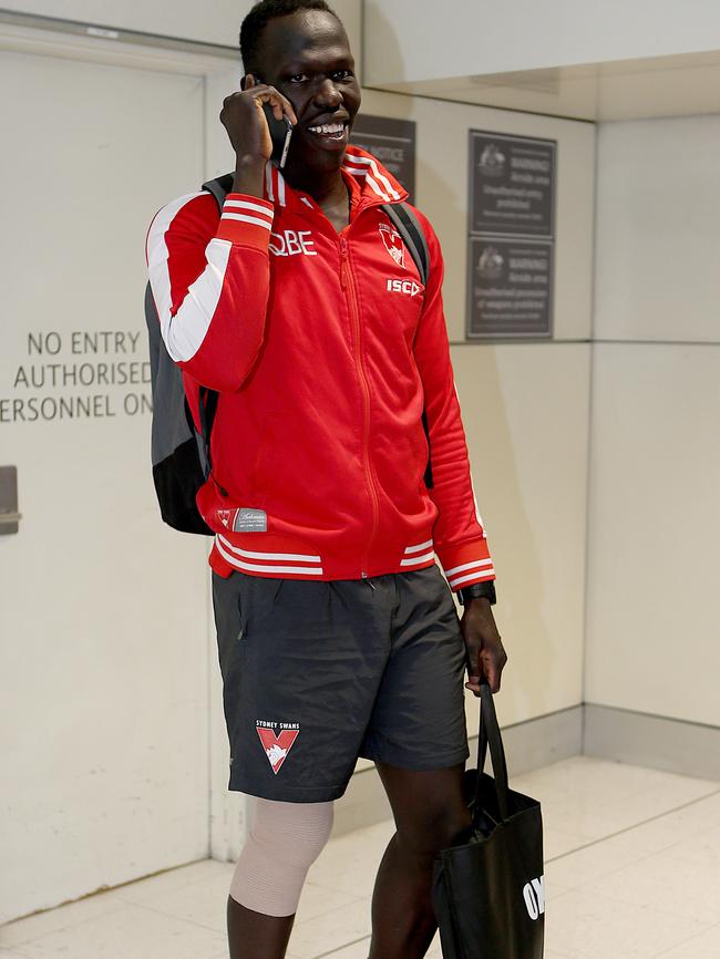 Aliir Aliir returns to Sydney after the Swans’ preliminary final win.