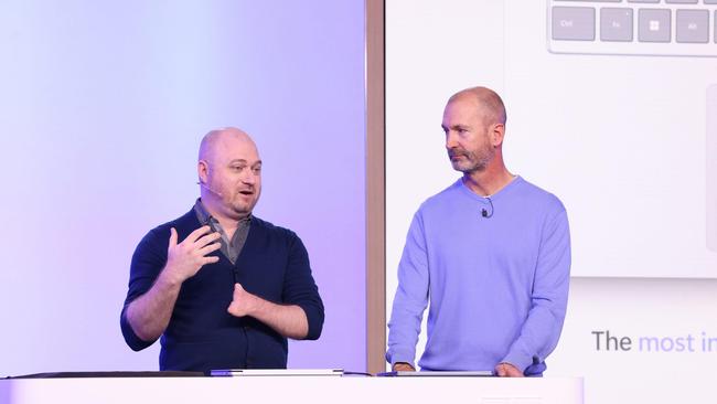 Brett Ostrum (R), Microsoft corporate vice president for Surface devices, with Solomon Romney, demonstrating how the company’s has produced its most powerful and inclusive laptop yet.