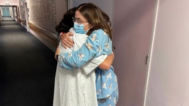 Kirsty Bryant embraces mother Michelle Hayto. Image: Via ABC.net.au