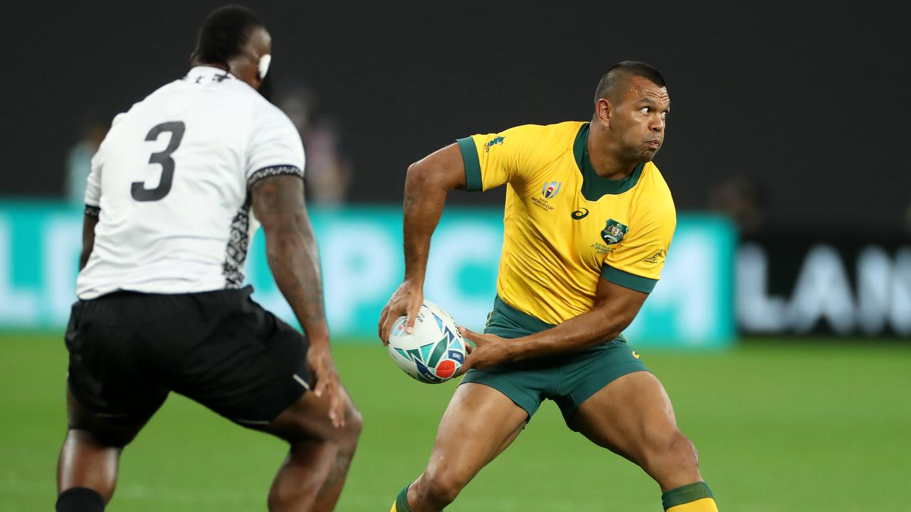 Beale spins the ball wide during Australia’s first-up victory over Fiji. Picture: Getty