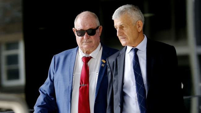 The father of former NSW police minister Troy Grant, Kenneth Wayne Grant, (left) leaves Newcastle Local Court in Newcastle last year. (AAP Image/Darren Pateman)