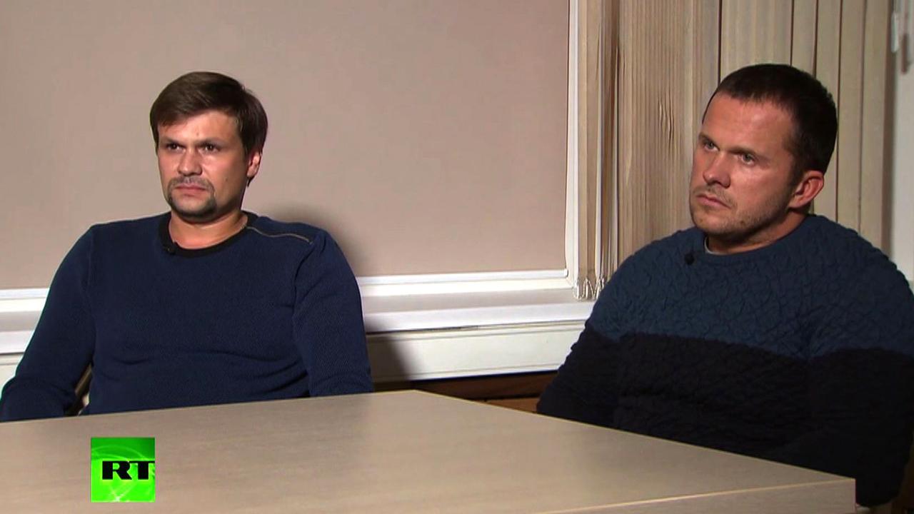 A screengrab taken on September 13, 2018, from footage broadcast by Russia's state broadcaster Russia Today (RT), shows two men, purported to be Alexander Petrov and Ruslan Boshirov taking part in a television interview. Picture: AFP