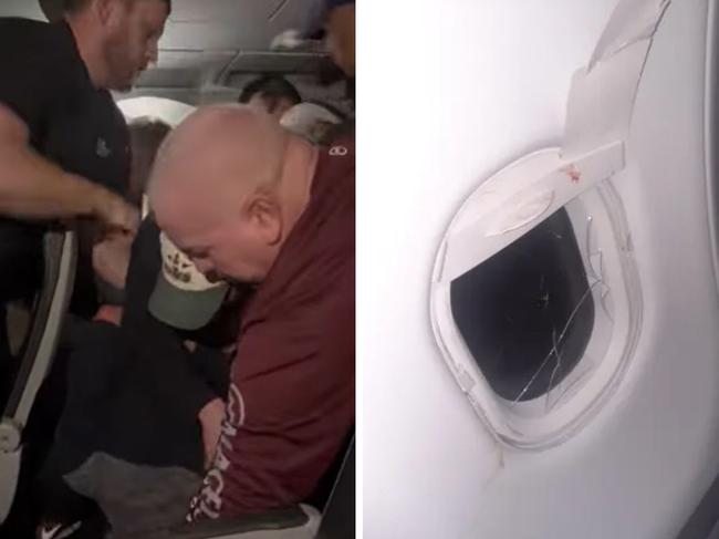 An unruly man was restrained by passengers on a flight after he began kicking seats and hitting a window, eventually breaking the Plexiglas.