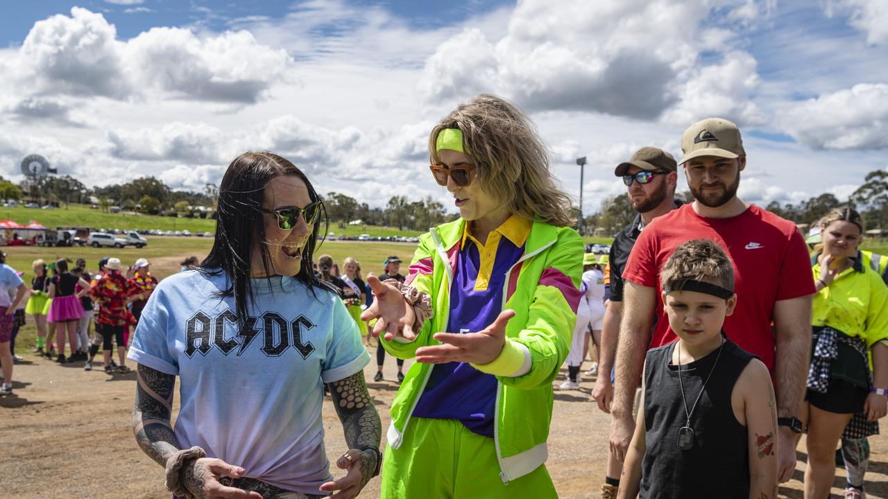 Amber Dawson (left) and Letitia Ruwoldt participate in a smoking ceremony before the star of the Relay for Life at Toowoomba Showgrounds, Saturday, September 10, 2022. Picture: Kevin Farmer