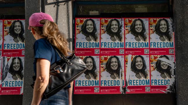 Posters of Democratic presidential candidate, US Vice President Kamala Harris during the first day of the Democratic National Convention (DNC) in downtown Chicago on August 19.