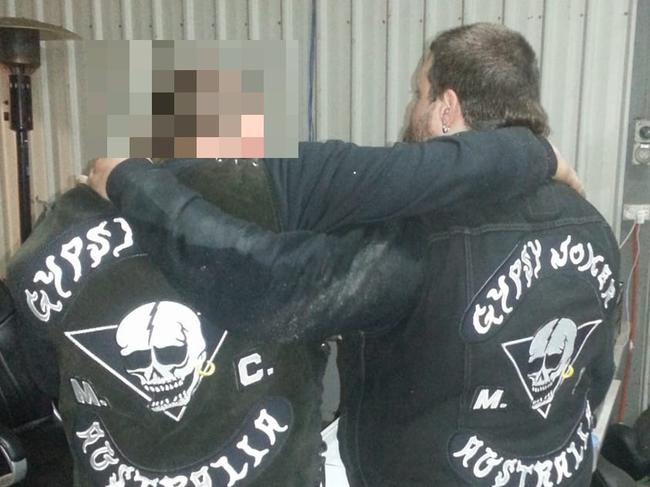 Bikie fronts court for allegedly breaking anti-gang laws