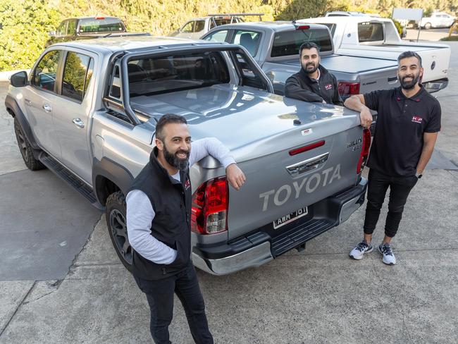 Massih Aimaq (centre), along with his brother Masood Aimaq (right) and life-long friend Omer Dost (left), are the founders and directors of ute 'bling' makers HSP 4x4 Accessories.  Supplied image