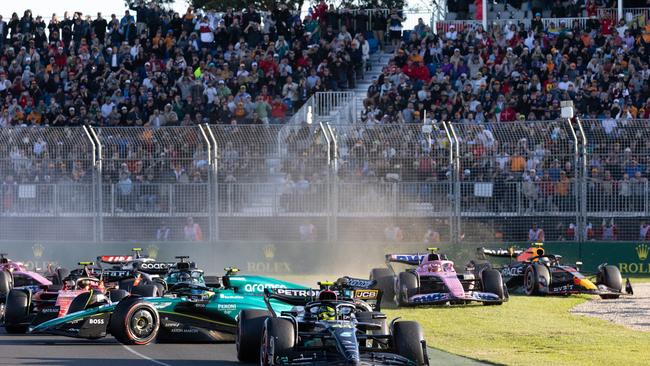 Sainz was penalised for his role in the incident which led to Fernando Alonso (14) spinning out. Picture: Getty