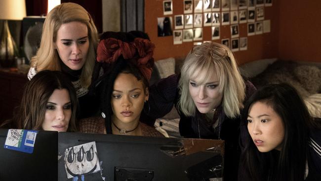 This image released by Warner Bros. shows, from foreground left, Sandra Bullock Sarah Paulson, Rihanna, Cate Blanchett and Awkwafina in a scene from "Ocean's 8." (Barry Wetcher/Warner Bros. via AP)