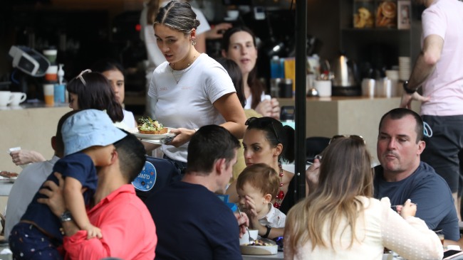Diners are seen at South Bank, Brisbane on the second day of mandatory COVID-19 vaccinations in Queensland on Saturday.