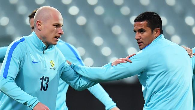 Aaron Mooy and Tim Cahill during Socceroos training.