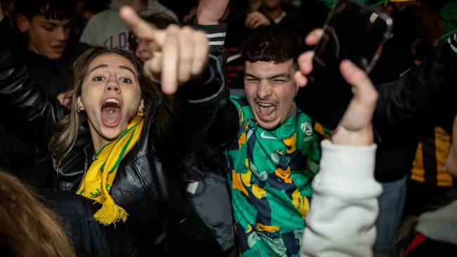 Fans at Federation Square react after Australia scores as they watch the Matildas FIFA World Cup Semi Final Game. Picture: Getty